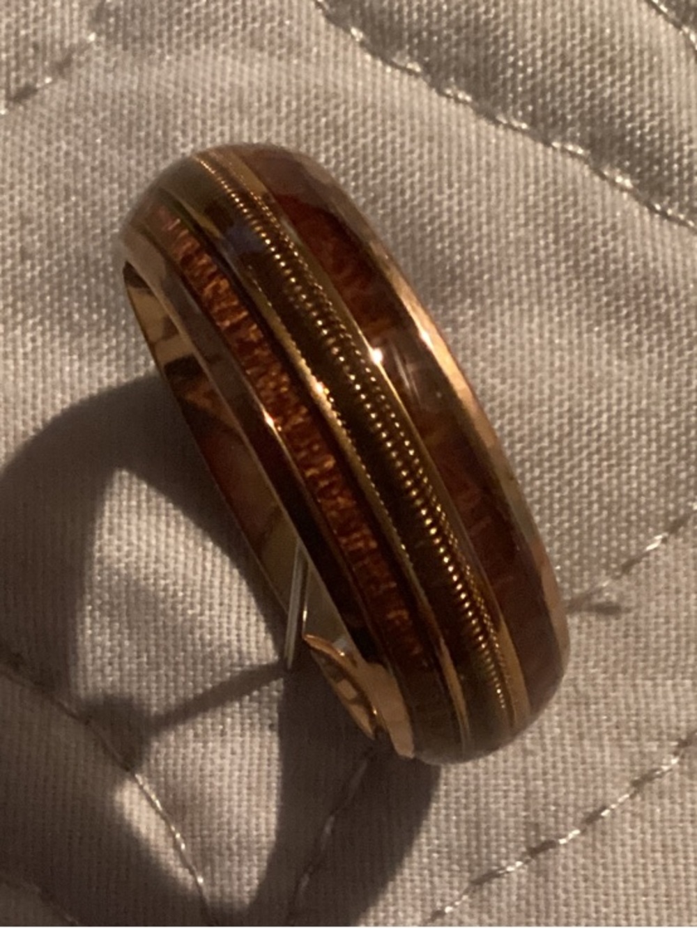 Gold Tone Hinged Bangle Bracelet with Brown Inlay